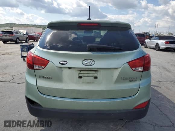 2011 Hyundai Tucson GLS z VIN KM8JU3AC9BU281032, wystawiony jako Copart lot #81838955 z przebiegiem 221 853 mil mil oraz Czysty tytuł • Clean title. Historia ofert i sprzedaży dostępna na DreamBid. Obrazek 6.