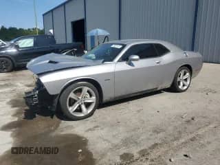 2017 Dodge Challenger R/T с VIN 2C3CDZBT2HH639585, выставлен на аукционе Copart как лот 70631415 с пробегом 89 467 миль миль и Списание • Salvage title. История ставок и продаж доступна на DreamBid. Изображение 1.