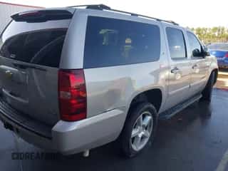 2007 Chevrolet Suburban LT z VIN 3GNFC160X7G216627, wystawiony jako IAAI lot #43445940 z przebiegiem 312 650 mil mil oraz . Historia ofert i sprzedaży dostępna na DreamBid. Obrazek 6.
