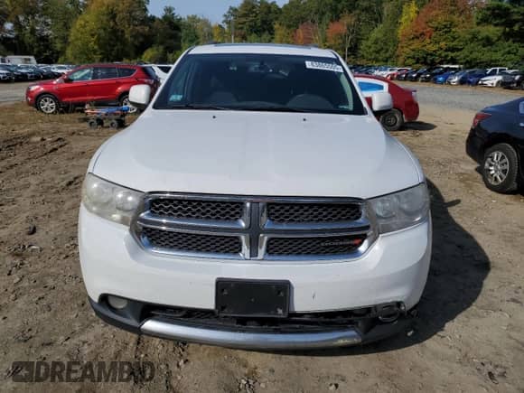 2013 Dodge Durango SXT z VIN 1C4RDJAGXDC559265, wystawiony jako Copart lot #83865505 z przebiegiem 238 069 mil mil oraz Czysty tytuł • Clean title. Historia ofert i sprzedaży dostępna na DreamBid. Obrazek 5.