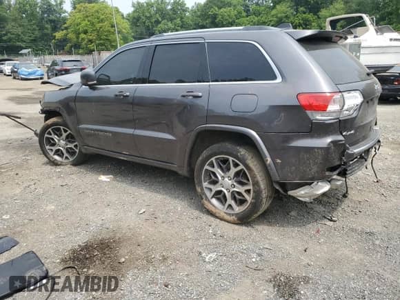 2018 Jeep Grand Cherokee Sterling with VIN 1C4RJFBT5JC258626, listed as a Copart auction lot 59767425 with 96,731 mi miles and Salvage title. Bid and sale history available at DreamBid. Image 2.