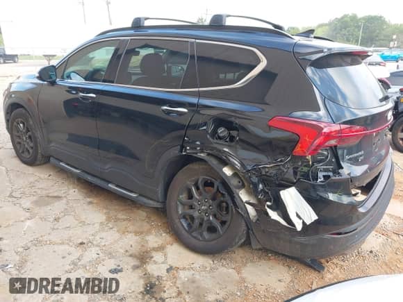 2023 Hyundai Santa Fe XRT with VIN 5NMS64AJ3PH552107, listed as a IAAI auction lot 42621771 with 37,022 mi miles and . Bid and sale history available at DreamBid. Image 3.