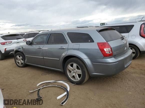 2006 Dodge Magnum SXT with VIN 2D4GZ47V76H473558, listed as a Copart auction lot 72087564 with 122,810 mi miles and Salvage title. Bid and sale history available at DreamBid. Image 2.