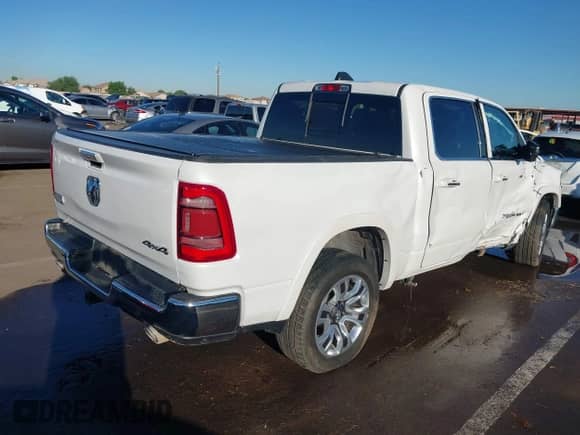 2021 Ram 1500 Longhorn with VIN 1C6SRFKT7MN679290, listed as a IAAI auction lot 43450315 with 55,494 mi miles and . Bid and sale history available at DreamBid. Image 4.