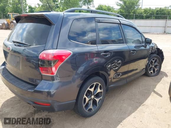 2015 Subaru Forester XT Premium z VIN JF2SJGDCXFH552071, wystawiony jako IAAI lot #42892071 z przebiegiem 116 909 mil mil oraz . Historia ofert i sprzedaży dostępna na DreamBid. Obrazek 4.