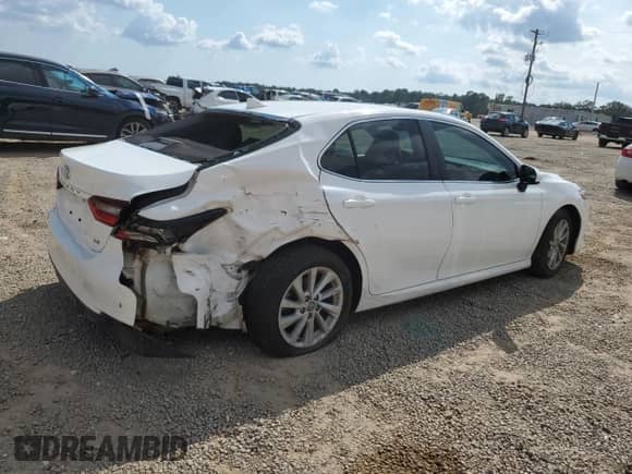 2022 Toyota Camry LE с VIN 4T1C11AK0NU069718, выставлен на аукционе Copart как лот 71914715 с пробегом 49 755 миль миль и На запчасти • Non repairable. История ставок и продаж доступна на DreamBid. Изображение 3.