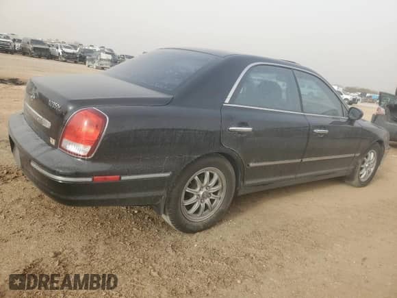 2002 Hyundai XG L with VIN KMHFU45E82A175616, listed as a Copart auction lot 47496675 with 60,801 mi miles and Salvage title. Bid and sale history available at DreamBid. Image 3.