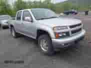 2011 Chevrolet Colorado 1LT z VIN 1GCHTCFE4B8111542, wystawiony jako IAAI lot #42168554 z przebiegiem 79 611 mil mil oraz . Historia ofert i sprzedaży dostępna na DreamBid. Obrazek 1.