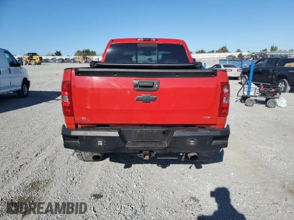 2009 Chevrolet Silverado 1500 LTZ with VIN 3GCEK33339G230826, listed as a Copart auction lot 71809015 with 198,069 mi miles and Salvage title. Bid and sale history available at DreamBid. Image 6.