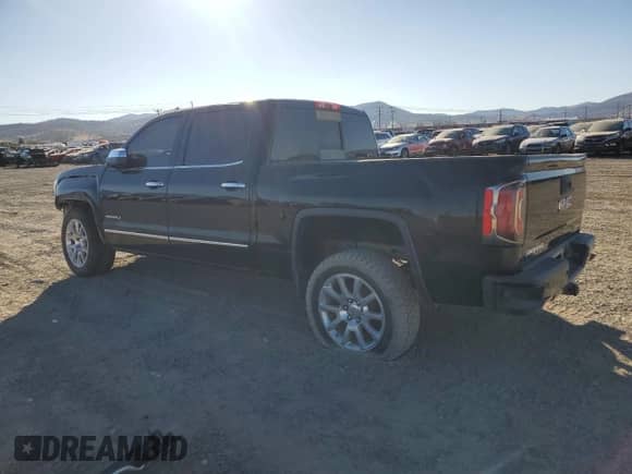 2016 GMC Sierra 1500 Denali z VIN 3GTU2PEJ5GG133865, wystawiony jako Copart lot #78105274 z przebiegiem 128 467 mil mil oraz Szkoda całkowita • Salvage title. Historia ofert i sprzedaży dostępna na DreamBid. Obrazek 2.