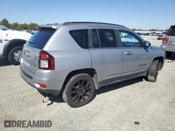 2014 Jeep Compass Sport with VIN 1C4NJCBA8ED822930, listed as a Copart auction lot 81718935 with 126,687 mi miles and Salvage title. Bid and sale history available at DreamBid. Image 3.