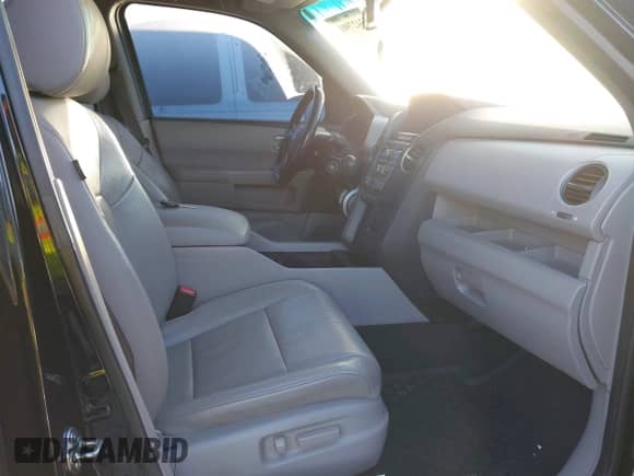 2015 Honda Pilot EX-L with VIN 5FNYF4H56FB052123, listed as a IAAI auction lot 43427901 with 197,741 mi miles and . Bid and sale history available at DreamBid. Image 5.