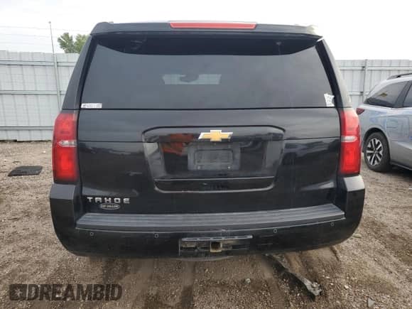 2015 Chevrolet Tahoe LT с VIN 1GNSKBKC9FR736808, выставлен на аукционе Copart как лот 82057335 с пробегом 165 828 миль миль и Списание • Salvage title. История ставок и продаж доступна на DreamBid. Изображение 6.
