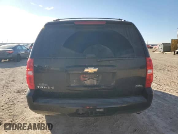 2011 Chevrolet Tahoe LS с VIN 1GNSKAE00BR295771, выставлен на аукционе Copart как лот 85968614 с пробегом 142 535 миль миль и Списание • Salvage title. История ставок и продаж доступна на DreamBid. Изображение 6.