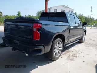 2023 Chevrolet Silverado 1500 High Country z VIN 1GCUDJE8XPZ195721, wystawiony jako IAAI lot #42177581 z przebiegiem Nie podano mil oraz . Historia ofert i sprzedaży dostępna na DreamBid. Obrazek 4.