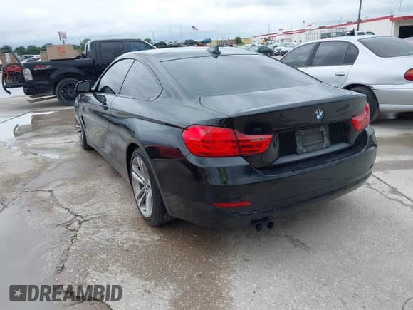 2014 BMW 4 Series 428i with VIN WBA3N7C58EF719495, listed as a IAAI auction lot 42490625 with 179,410 mi miles and . Bid and sale history available at DreamBid. Image 3.