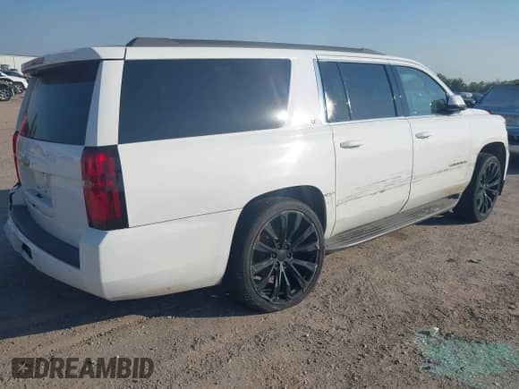 2016 Chevrolet Suburban LT z VIN 1GNSCHKC2GR455015, wystawiony jako IAAI lot #43211962 z przebiegiem 158 120 mil mil oraz . Historia ofert i sprzedaży dostępna na DreamBid. Obrazek 4.