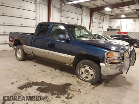 2000 GMC Sierra 1500 SLE z VIN 1GTEK19T8YE297889, wystawiony jako IAAI lot #43489121 z przebiegiem 184 419 mil mil oraz . Historia ofert i sprzedaży dostępna na DreamBid. Obrazek 1.