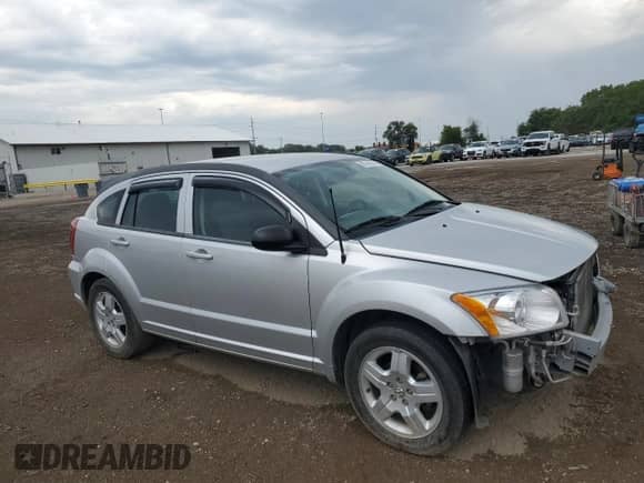 2009 Dodge Caliber SXT z VIN 1B3HB48AX9D181259, wystawiony jako Copart lot #80146215 z przebiegiem 94 695 mil mil oraz Szkoda całkowita • Salvage title. Historia ofert i sprzedaży dostępna na DreamBid. Obrazek 4.