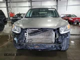 2012 Hyundai Santa Fe Limited z VIN 5XYZKDAGXCG152385, wystawiony jako Copart lot #63775244 z przebiegiem 149 243 mil mil oraz Szkoda całkowita • Salvage title. Historia ofert i sprzedaży dostępna na DreamBid. Obrazek 5.