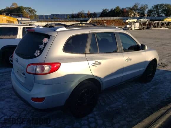 2012 Hyundai Santa Fe Limited with VIN 5XYZK4AG9CG113819, listed as a Copart auction lot 90697815 with 233,508 mi miles and Clean title. Bid and sale history available at DreamBid. Image 3.