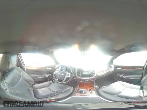 2012 Chrysler 300 Limited с VIN 2C3CCAHG0CH184842, выставлен на аукционе Copart как лот 65415505 с пробегом 175 204 миль миль и Списание • Salvage title. История ставок и продаж доступна на DreamBid. Изображение 14.