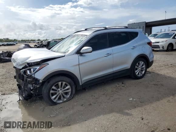 2018 Hyundai Santa Fe 2.0T с VIN 5XYZUDLA8JG508459, выставлен на аукционе Copart как лот 62694805 с пробегом 57 558 миль миль и Списание • Salvage title. История ставок и продаж доступна на DreamBid. Изображение 1.