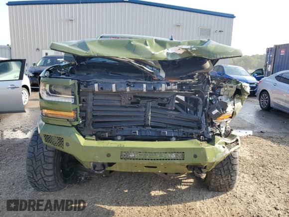 2018 Chevrolet Silverado 1500 LT z VIN 3GCUKREC6JG500373, wystawiony jako Copart lot #61946725 z przebiegiem Nie podano mil oraz Nie do naprawy • Non repairable. Historia ofert i sprzedaży dostępna na DreamBid. Obrazek 5.