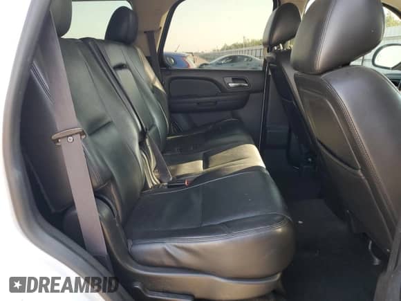 2013 Chevrolet Tahoe LTZ with VIN 1GNSKCE00DR315063, listed as a Copart auction lot 71993685 with 213,947 mi miles and Salvage title. Bid and sale history available at DreamBid. Image 11.