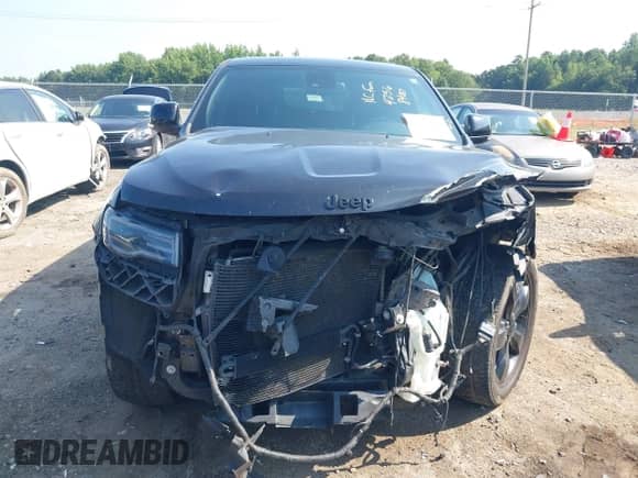 2015 Jeep Grand Cherokee Overland with VIN 1C4RJECG5FC119129, listed as a IAAI auction lot 42568400 with 177,312 mi miles and . Bid and sale history available at DreamBid. Image 13.
