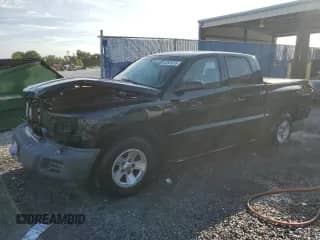 2008 Dodge Dakota SXT with VIN 1D7HE38K38S553825, listed as a Copart auction lot 62829315 with 118,348 mi miles and Salvage title. Bid and sale history available at DreamBid. Image 1.