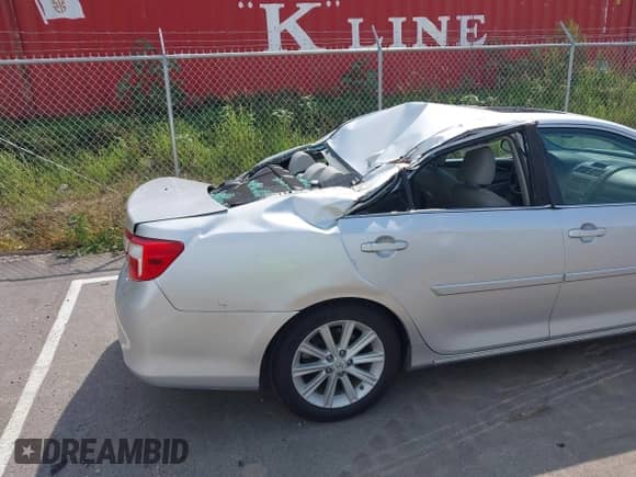 2013 Toyota Camry LE z VIN 4T1BD1FK6DU065053, wystawiony jako IAAI lot #42976116 z przebiegiem 231 999 mil mil oraz . Historia ofert i sprzedaży dostępna na DreamBid. Obrazek 6.