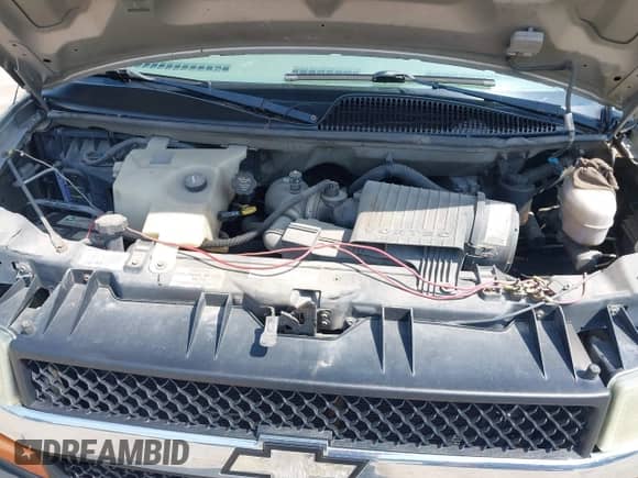 2004 Chevrolet Express Passenger with VIN 1GBFG15T041157045, listed as a IAAI auction lot 42486752 with 319,752 mi miles and . Bid and sale history available at DreamBid. Image 10.