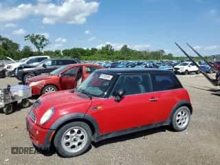 2005 MINI Hardtop with VIN WMWRC334X5TC59227, listed as a Copart auction lot 64195385 with 143,985 mi miles and Salvage title. Bid and sale history available at DreamBid. Image 1.