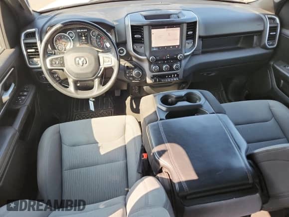 2023 Ram 1500 Big Horn with VIN 1C6SRFMT1PN628076, listed as a Copart auction lot 71742945 with 76,500 mi miles and Salvage title. Bid and sale history available at DreamBid. Image 8.