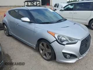 2013 Hyundai Veloster Turbo с VIN KMHTC6AEXDU175173, выставлен на аукционе IAAI как лот 42496567 с пробегом 124 322 миль миль и . История ставок и продаж доступна на DreamBid. Изображение 1.