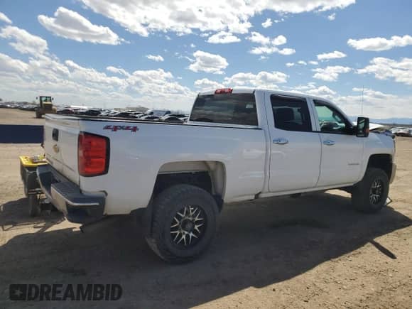 2017 Chevrolet Silverado 2500HD Work Truck with VIN 1GC1KUEG9HF227479, listed as a Copart auction lot 53292695 with 141,692 mi miles and Salvage title. Bid and sale history available at DreamBid. Image 3.