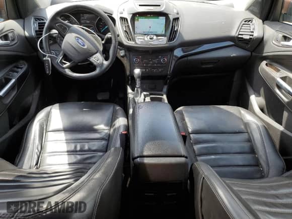 2017 Ford Escape Titanium with VIN 1FMCU0J9XHUA00876, listed as a Copart auction lot 59203535 with 125,942 mi miles and Salvage title. Bid and sale history available at DreamBid. Image 8.