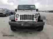 2012 Jeep Wrangler Sport с VIN 1C4AJWAG7CL101619, выставлен на аукционе Copart как лот 49294935 с пробегом 148 469 миль миль и Списание • Salvage title. История ставок и продаж доступна на DreamBid. Изображение 5.