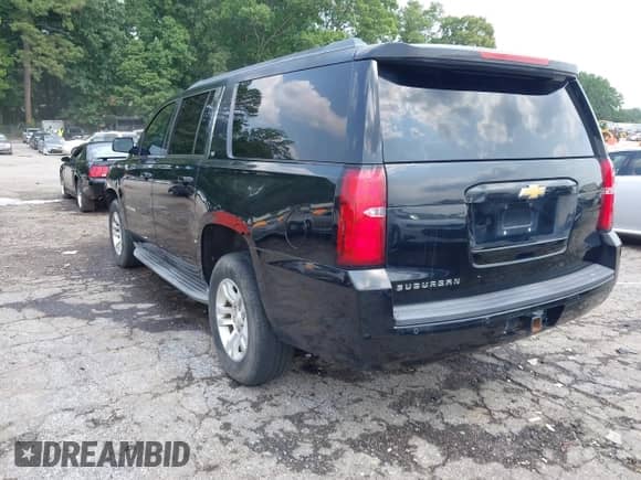 2015 Chevrolet Suburban LT with VIN 1GNSCJKC1FR591934, listed as a IAAI auction lot 42403284 with 299,882 mi miles and . Bid and sale history available at DreamBid. Image 3.