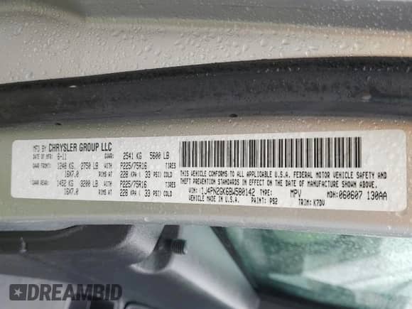 2011 Jeep Liberty Sport with VIN 1J4PN2GK6BW580142, listed as a Copart auction lot 82433075 with 119,651 mi miles and Clean title. Bid and sale history available at DreamBid. Image 13.