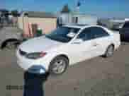 2002 Toyota Camry LE z VIN JTDBE32K820050500, wystawiony jako IAAI lot #42443589 z przebiegiem 262 287 mil mil oraz . Historia ofert i sprzedaży dostępna na DreamBid. Obrazek 2.