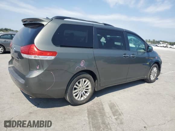 2012 Toyota Sienna XLE with VIN 5TDYK3DC8CS176623, listed as a Copart auction lot 80257225 with 262,472 mi miles and Salvage title. Bid and sale history available at DreamBid. Image 3.
