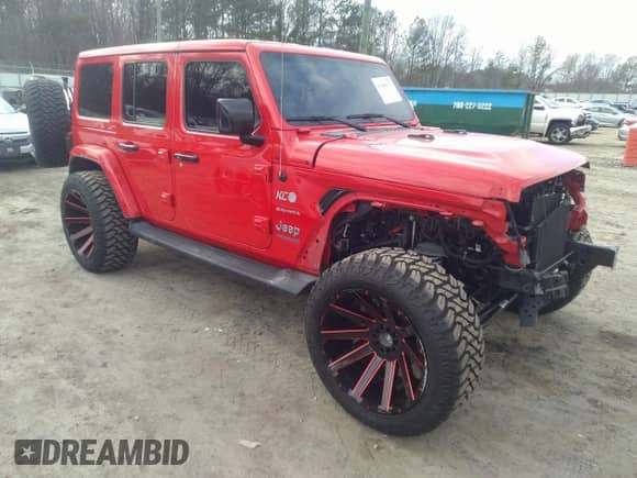 2022 Jeep Wrangler Unlimited Sahara with VIN 1C4JJXP62NW136932, listed as a IAAI auction lot 41486025 with 36,986 mi miles and . Bid and sale history available at DreamBid. Image 1.