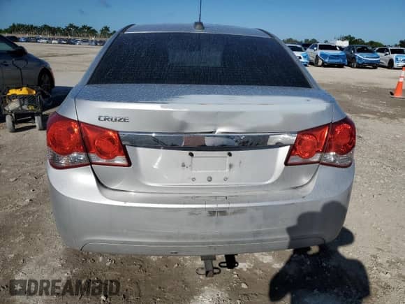 2015 Chevrolet Cruze LS with VIN 1G1PA5SH8F7244466, listed as a Copart auction lot 84595875 with 191,034 mi miles and Salvage title. Bid and sale history available at DreamBid. Image 6.