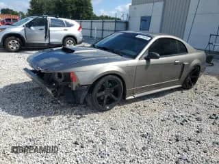 2002 Ford Mustang GT Deluxe с VIN 1FAFP42X82F192037, выставлен на аукционе Copart как лот 84775895 с пробегом 147 113 миль миль и Списание • Salvage title. История ставок и продаж доступна на DreamBid. Изображение 1.