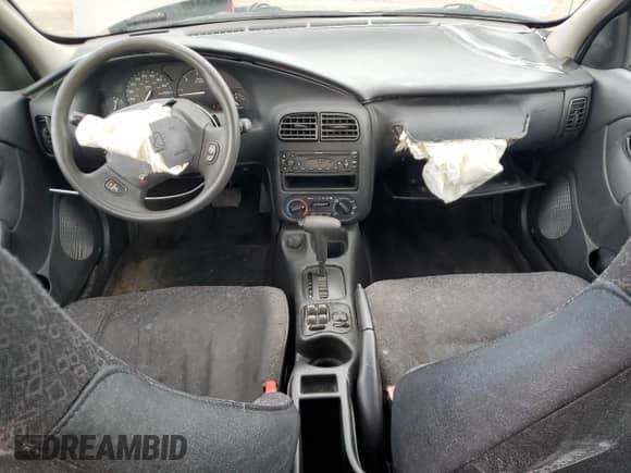 2000 Saturn SL with VIN 1G8ZH528XYZ217346, listed as a Copart auction lot 51164695 with 94,076 mi miles and Salvage title. Bid and sale history available at DreamBid. Image 8.