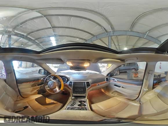 2012 Jeep Grand Cherokee Overland with VIN 1C4RJFCT4CC160396, listed as a Copart auction lot 71516165 with 135,574 mi miles and Salvage title. Bid and sale history available at DreamBid. Image 16.