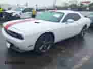 2013 Dodge Challenger SXT with VIN 2C3CDYAG7DH736726, listed as a IAAI auction lot 41530042 with 129,259 mi miles and . Bid and sale history available at DreamBid. Image 2.