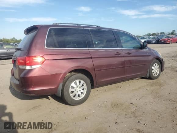 2009 Honda Odyssey EX with VIN 5FNRL384X9B003865, listed as a Copart auction lot 84802435 with 215,409 mi miles and Clean title. Bid and sale history available at DreamBid. Image 3.